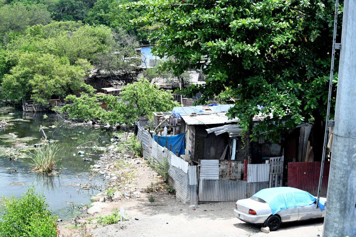 This file photo shows a section of a squatting community in New Haven, St Andrew.