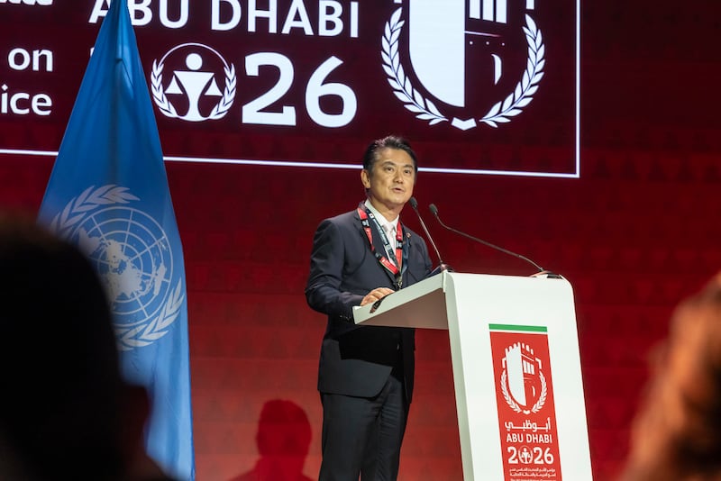 Japanese Justice Minister Takashi Yamashita addresses delegates. Antonie Robertson / The National