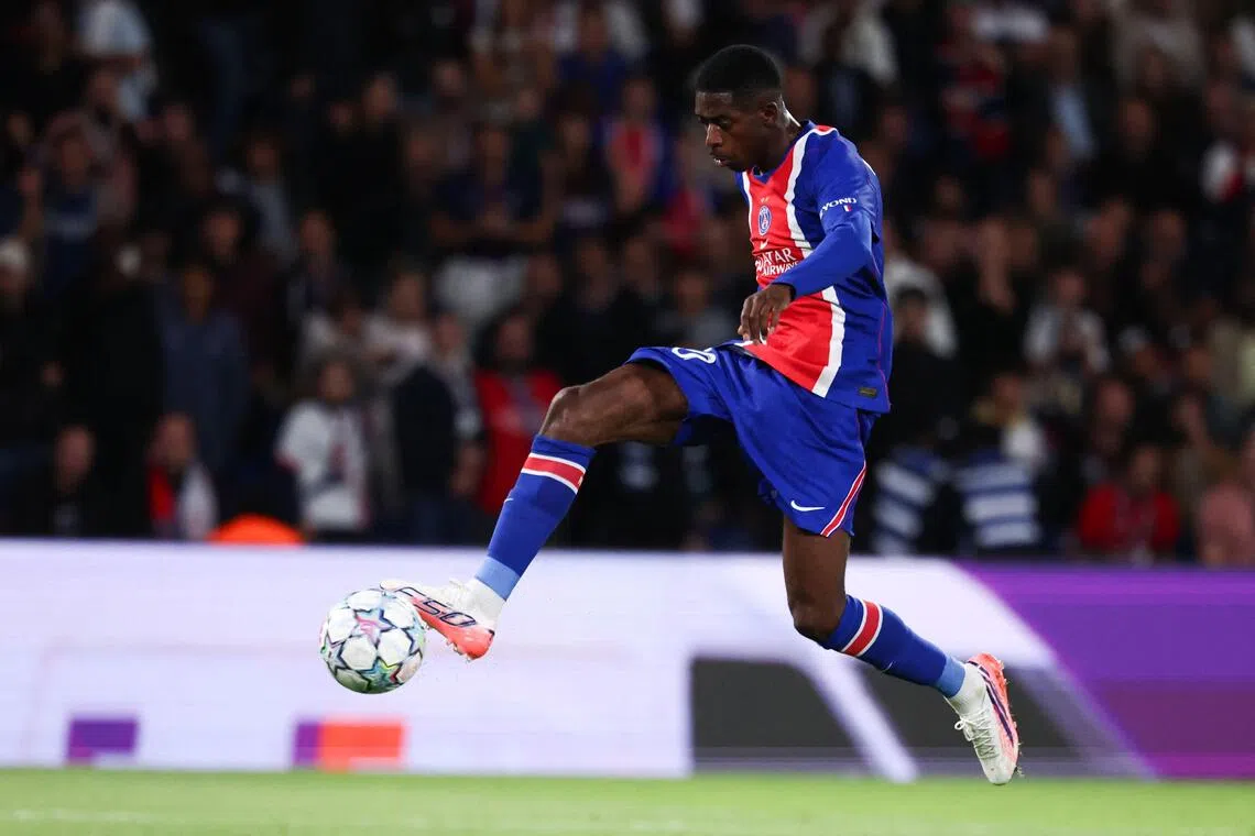PSG’s French forward Ousmane Dembele controls the ball during the Champions League clash against Slovan Bratislava at the Parc des Princes on Sept 9.