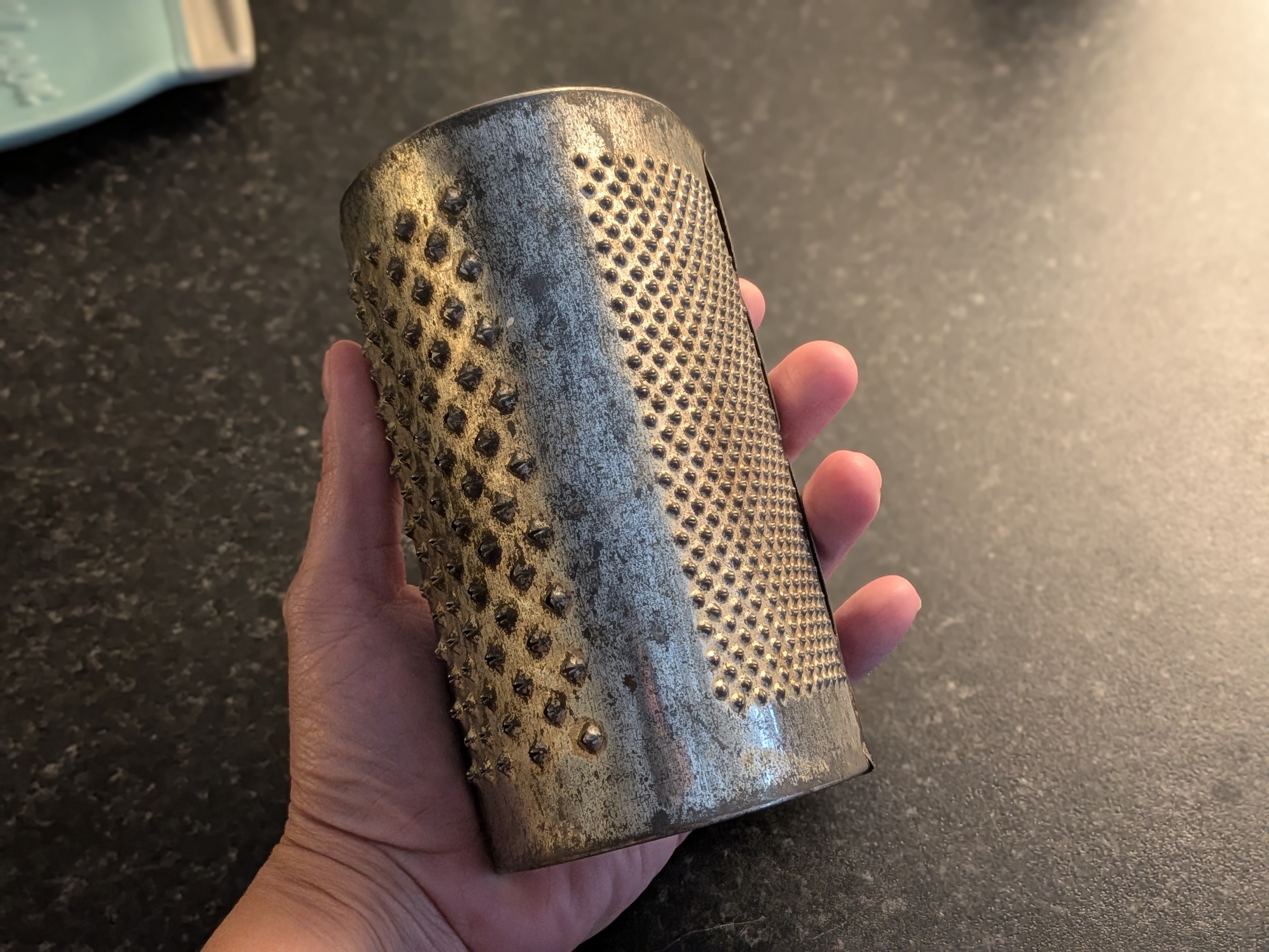 box grater held in hand